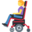 woman in motorized wheelchair